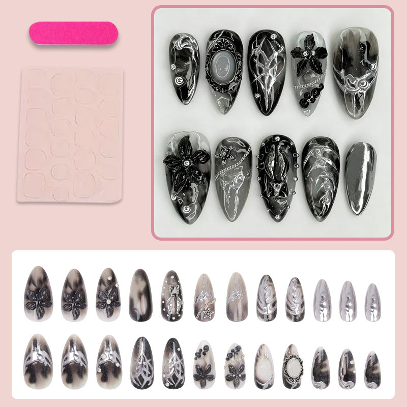 Artificial nail tips with glamorous black-and-white design Stornfield