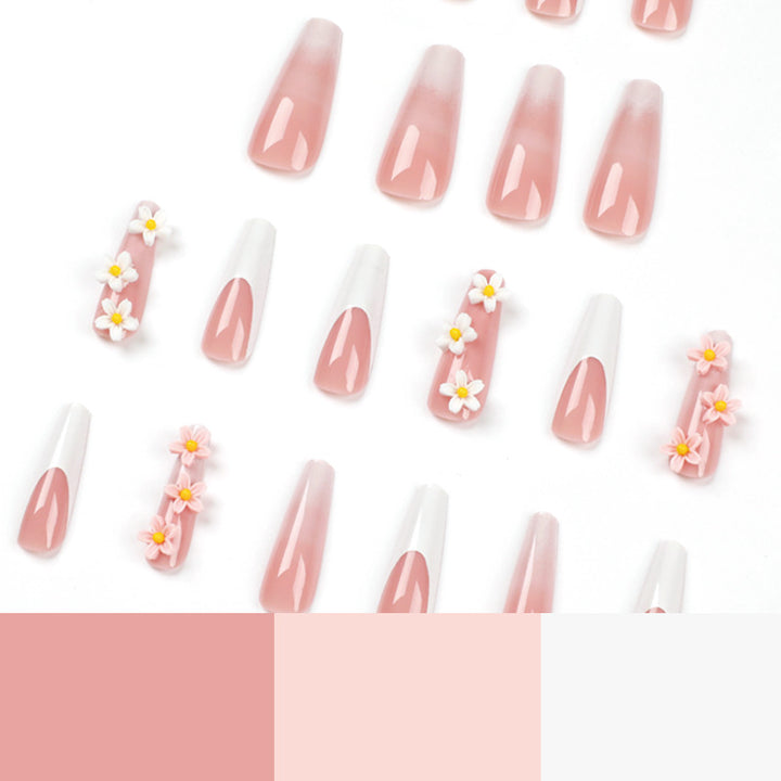 Artful nail extensions with elegant gradient and creative floral accents Stornfield