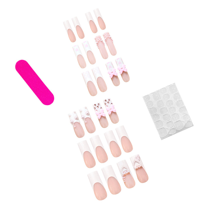 Artistic acrylic nails with bow and pearl decorations Stornfield