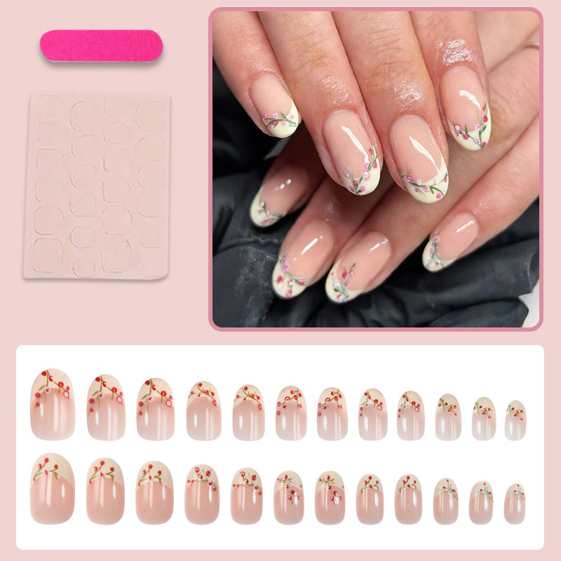 Artificial nail set with delicate rose accents Stornfield