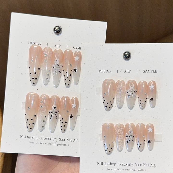 Acrylic Nails Set with Creative Designs and Shimmering Accents Stornfield