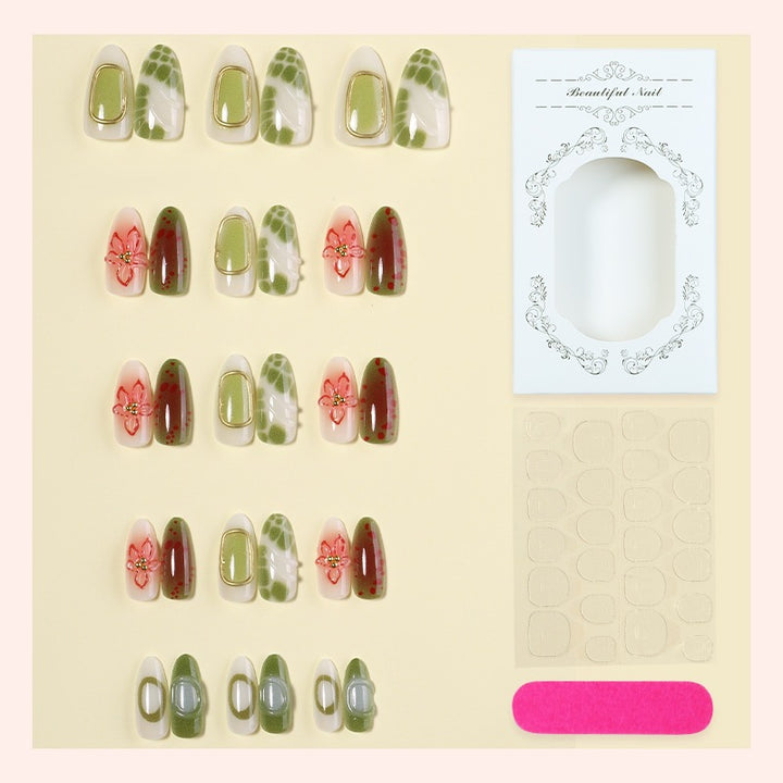 Artificial nail set with elegant floral designs and color accents Stornfield