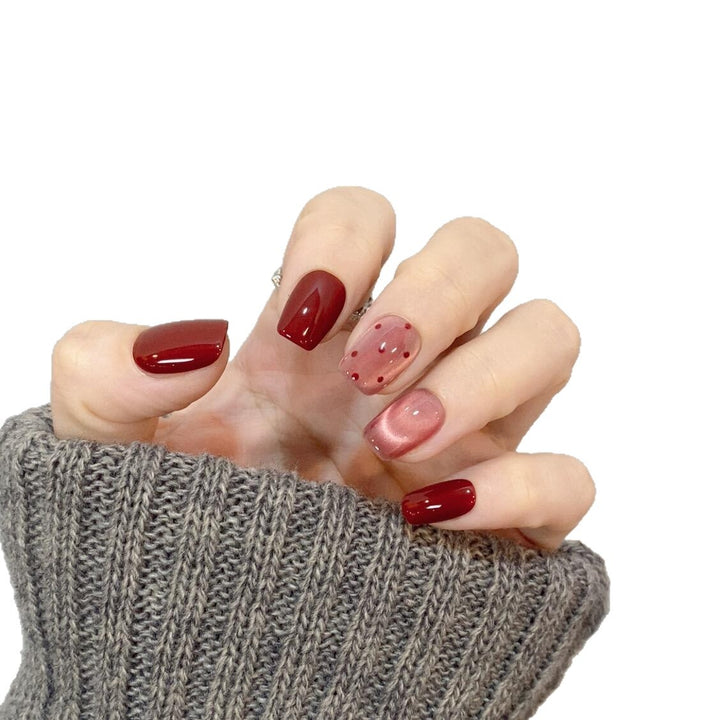 Artificial nail tips with creative dots and high gloss finish Stornfield