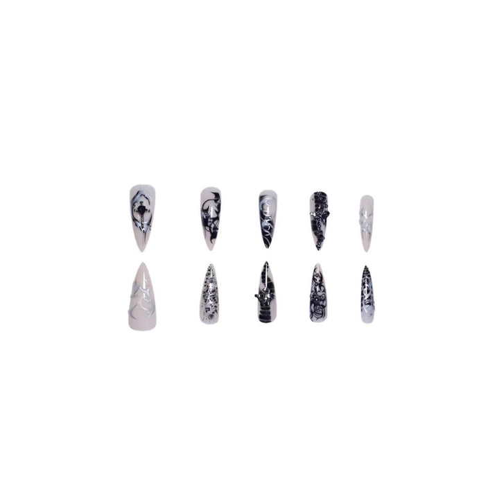 Artistic Stiletto Nail Extensions with Black Detailing Stornfield