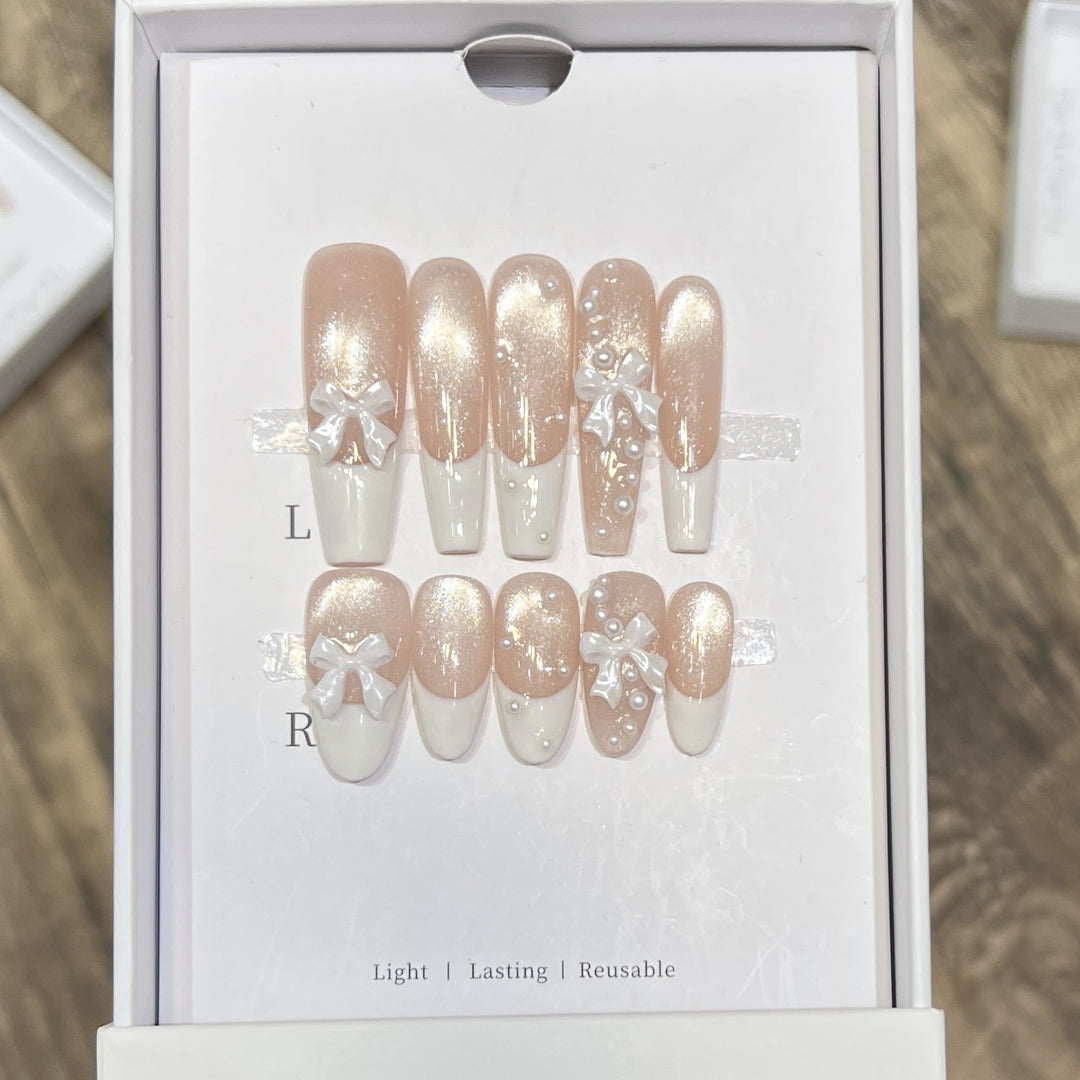 Decorative Long Press-On Nail Set with Bow and Pearl Accents Stornfield