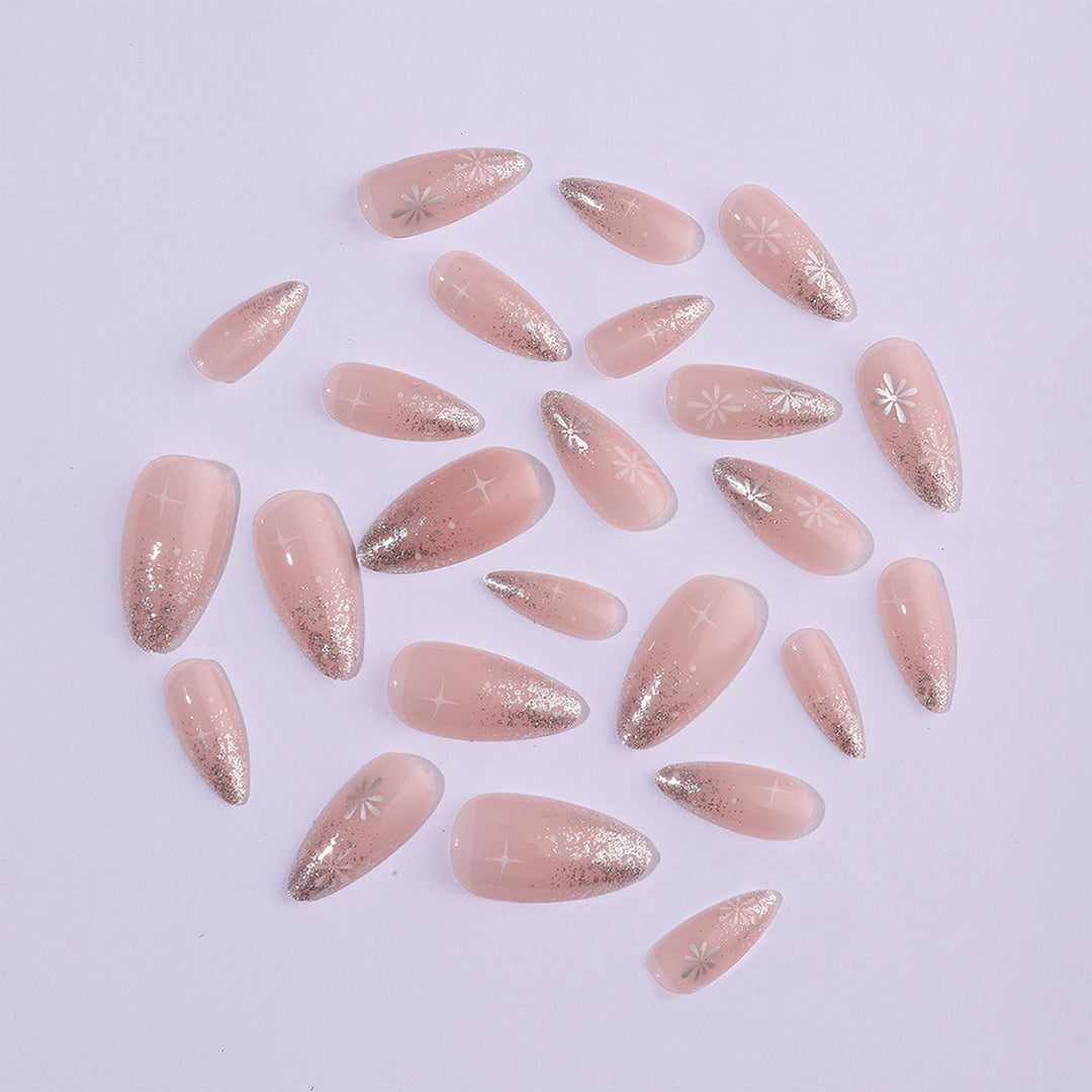 Nail art set with elegant glitter French design and artistic embellishments Stornfield