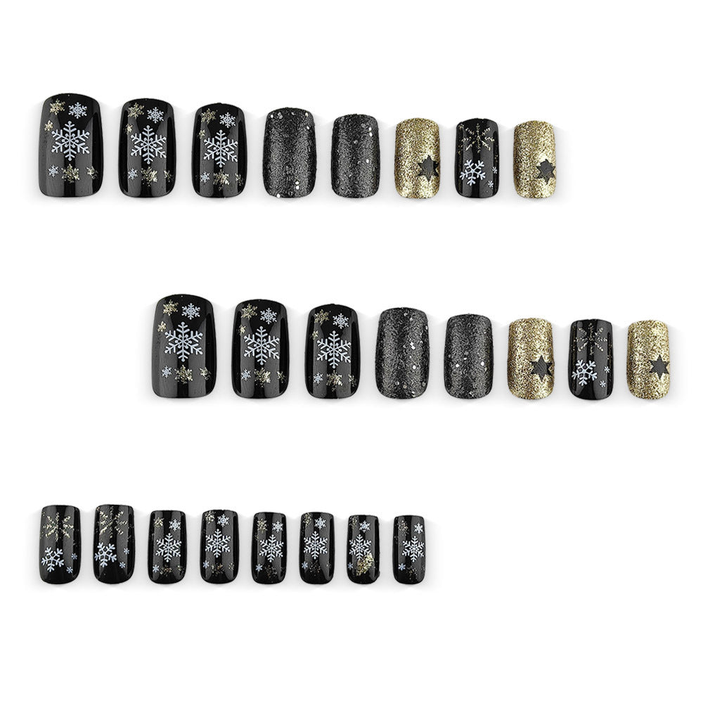 Creative artificial nails with sparkling glitter and festive winter design Stornfield