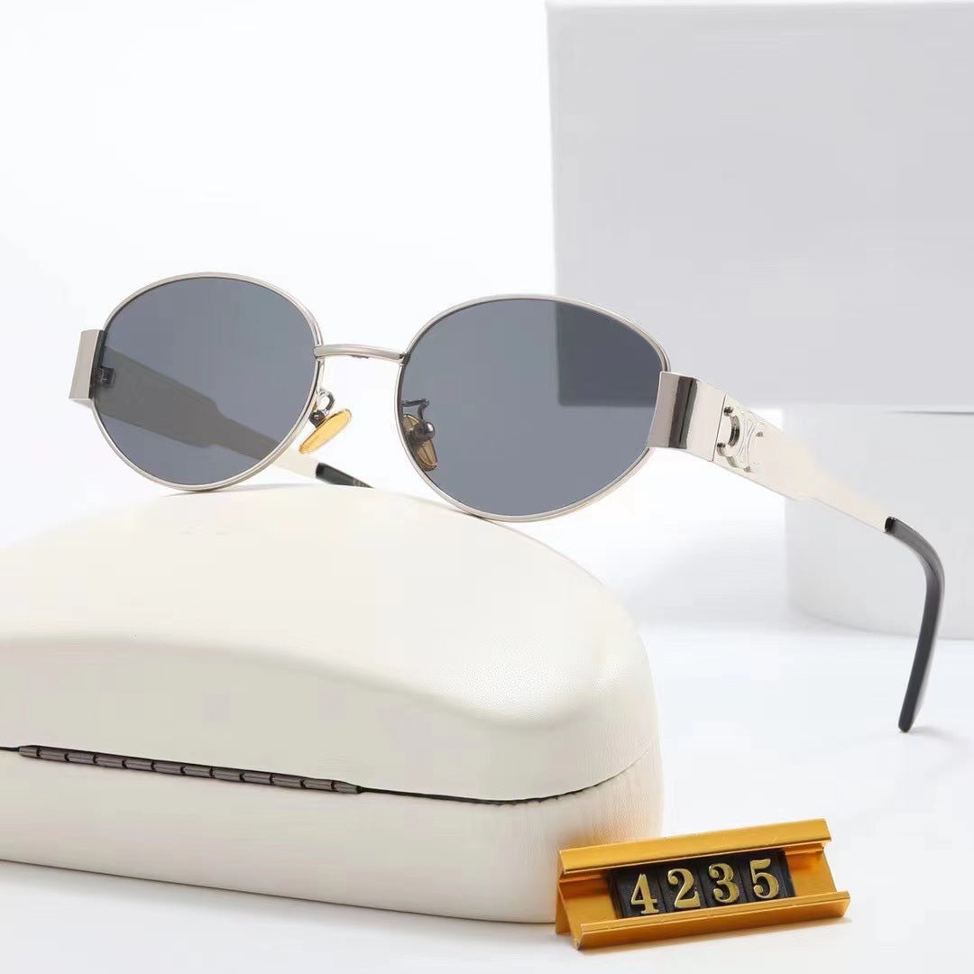 Women elegant oval sunglasses with gold-colored frame Stornfield