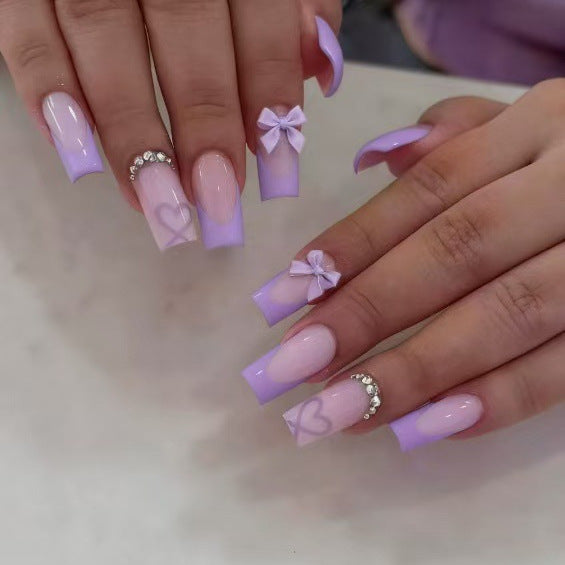 Artificial nail set with elegant 3D bows and glitter details Stornfield