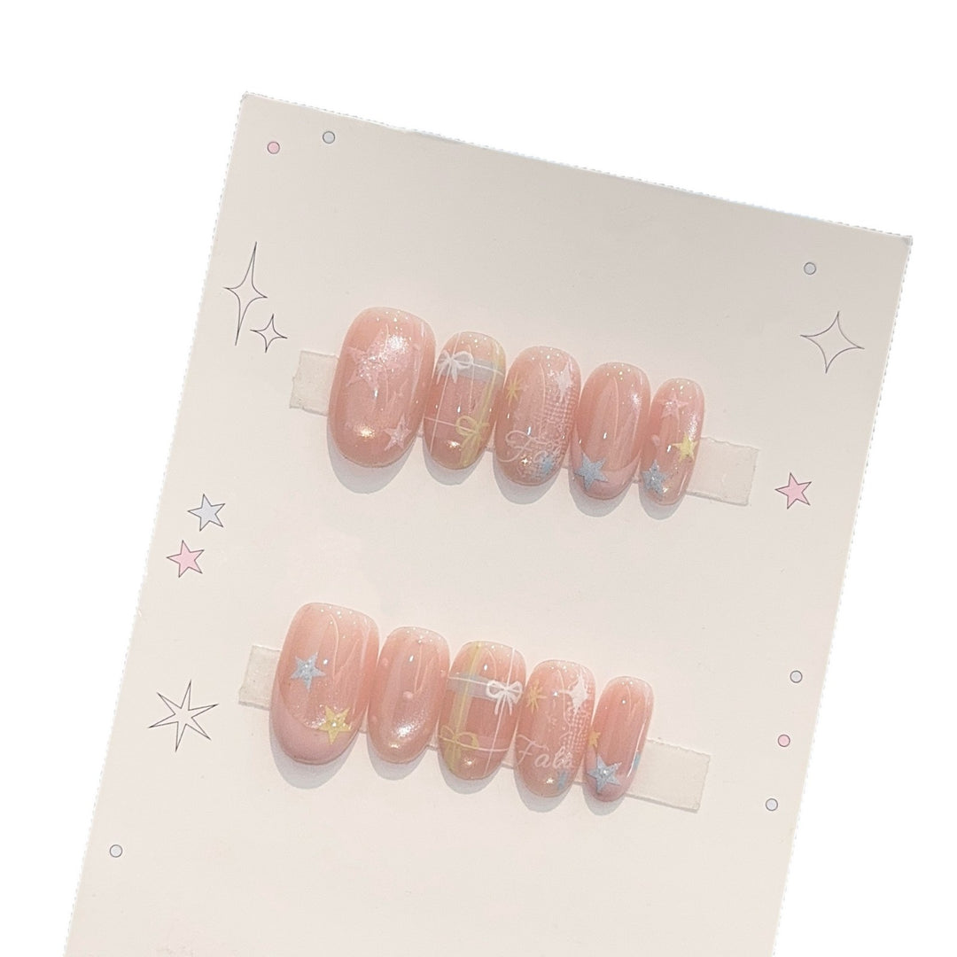 Artificial nails with romantic star and glitter motifs Stornfield
