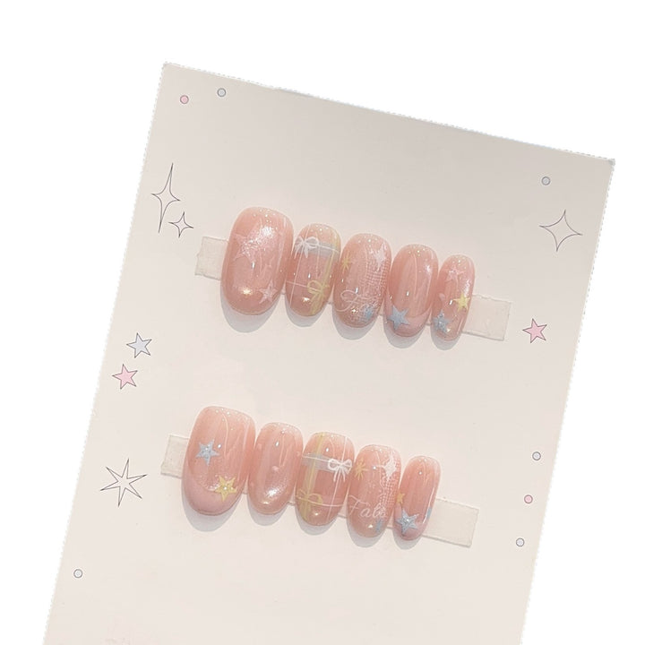 Artificial nails with romantic star and glitter motifs Stornfield