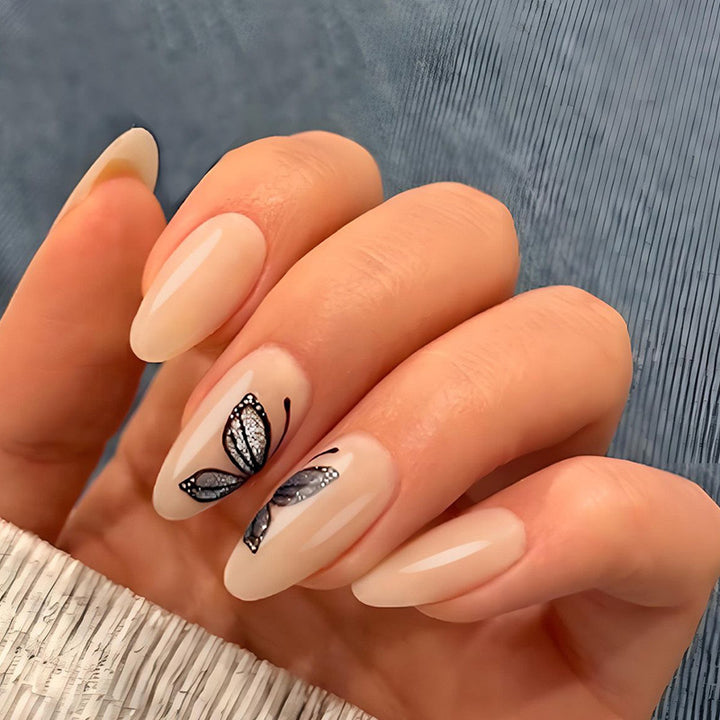 Artificial nail set with delicate butterfly motifs and elegant finish Stornfield