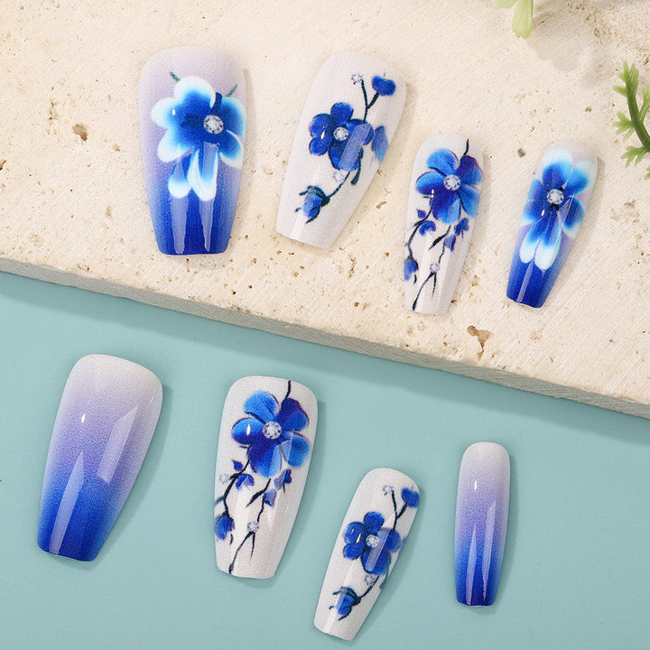 Artificial nails with floral accents Stornfield