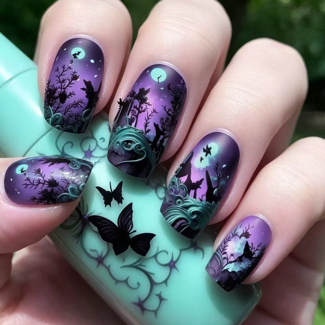 Nail art design with butterfly and night motif Stornfield