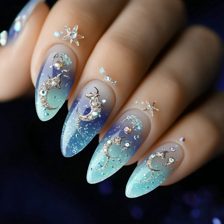 Artistic stiletto nails with glitter and marine motifs Stornfield