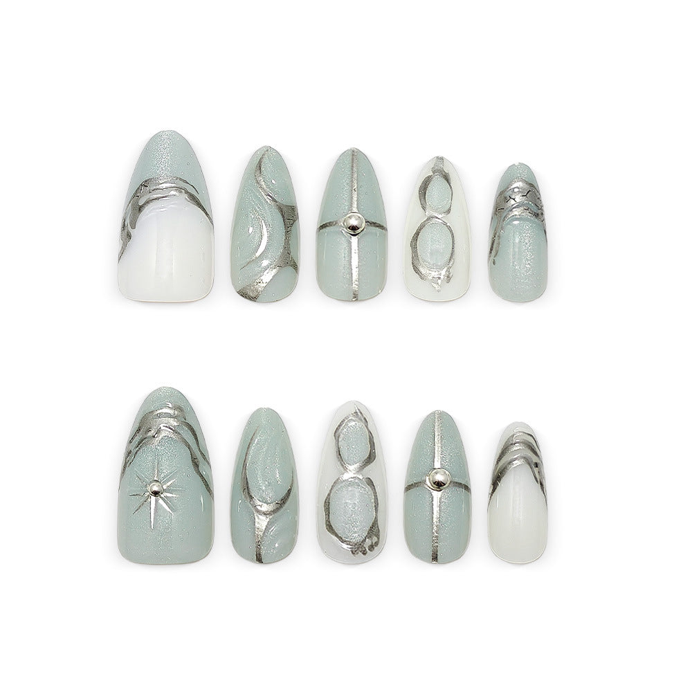 Elegant Artificial Nails with Artistic Accents Stornfield