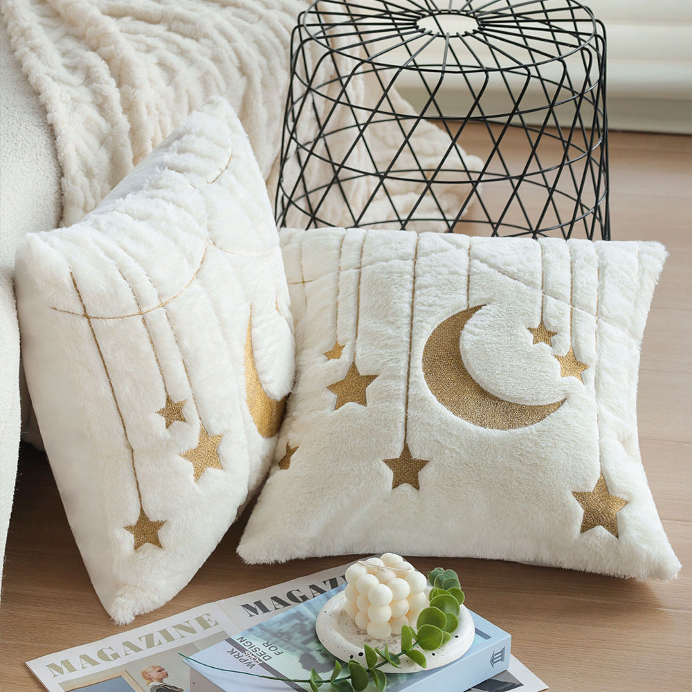 Cuddle pillow with star and moon motif