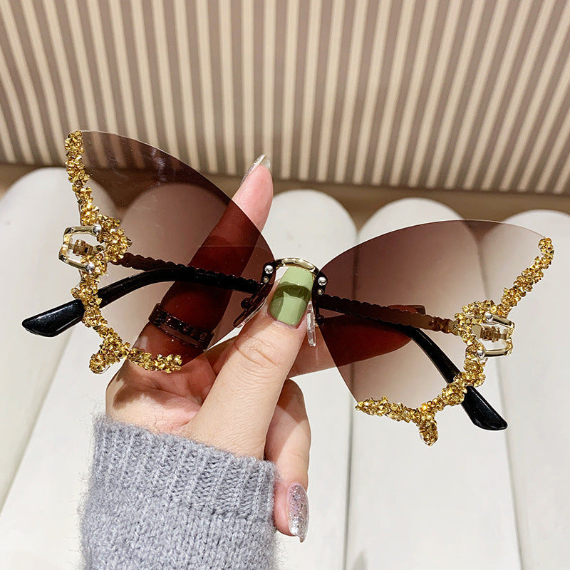 Women's extravagant sunglasses with sparkling butterfly design Stornfield