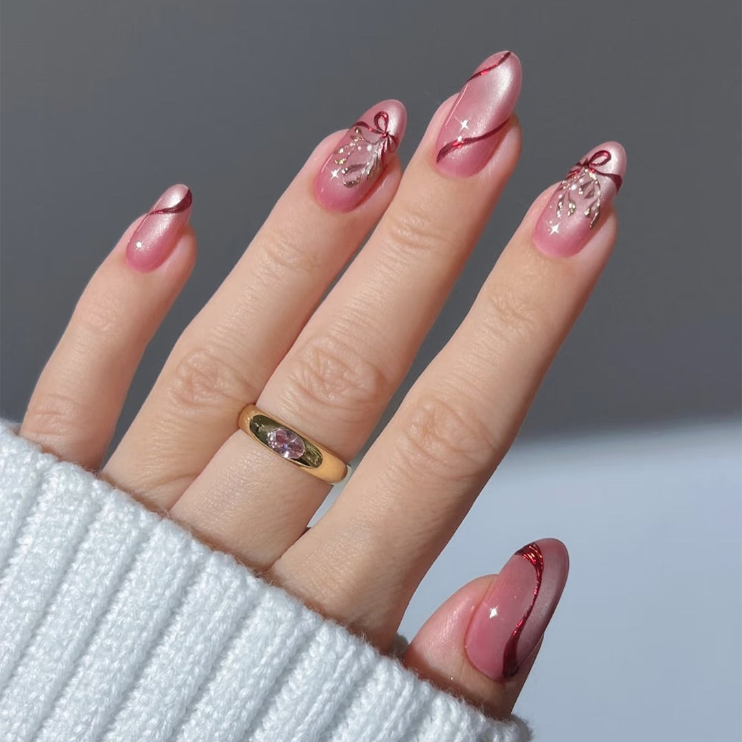 Nail art set with intricate bow and glitter decorations Stornfield