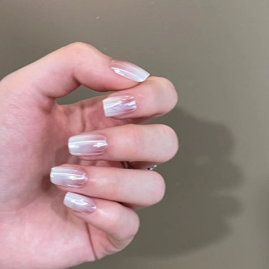 Artificial nail extensions in elegant ombre design Stornfield