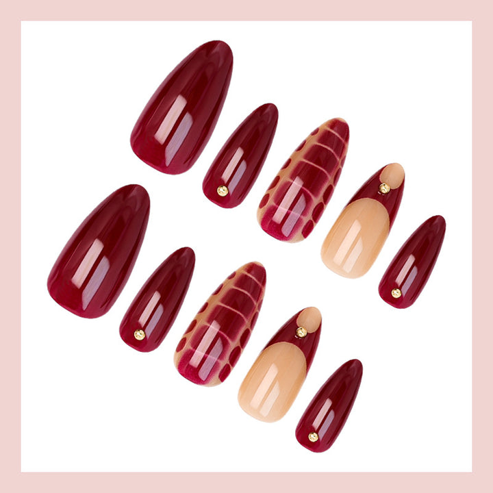 Acrylic nail set with elegant golden accents and trendy design Stornfield
