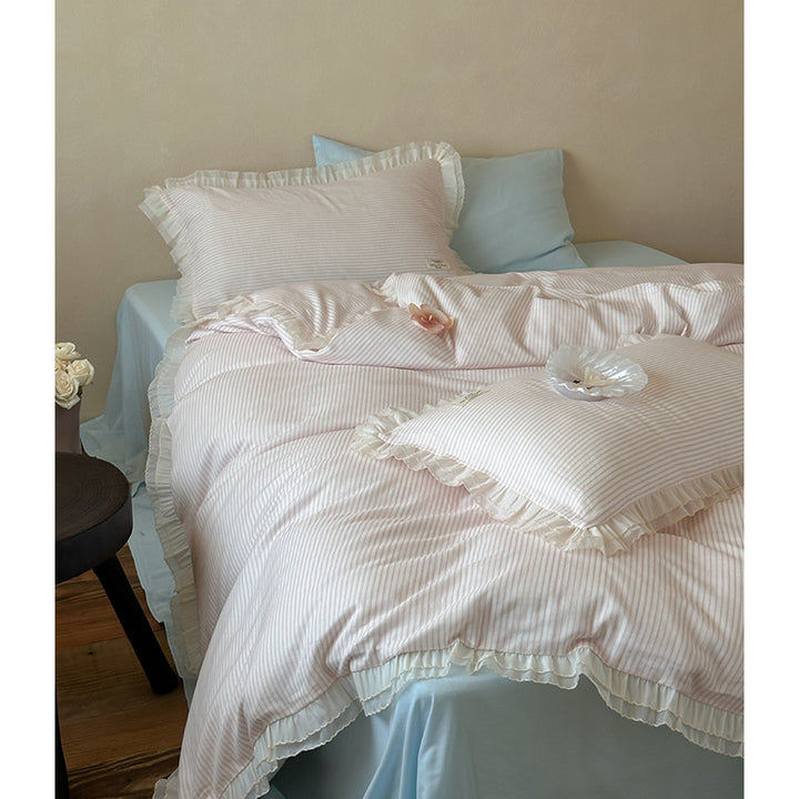 Bedding set made of cotton percale with a fine stripe pattern and gathered ruffle