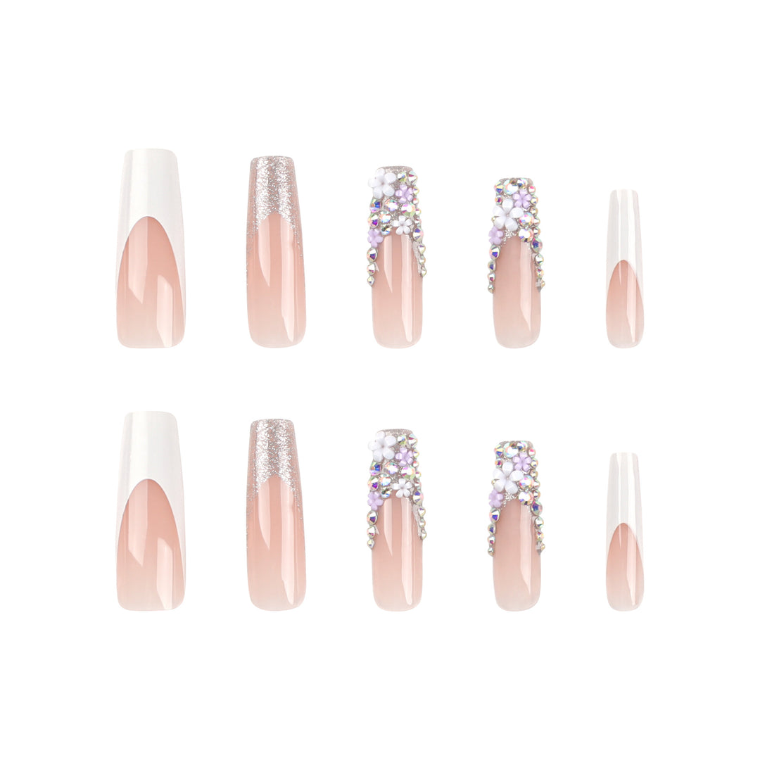 Artful Nail Extensions with Glitter and Flower Decor Stornfield