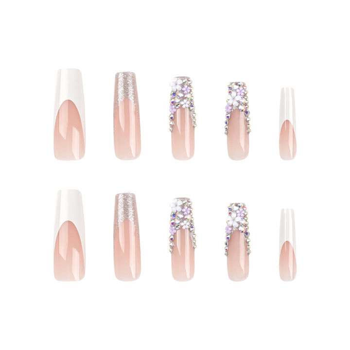 Artful Nail Extensions with Glitter and Flower Decor Stornfield