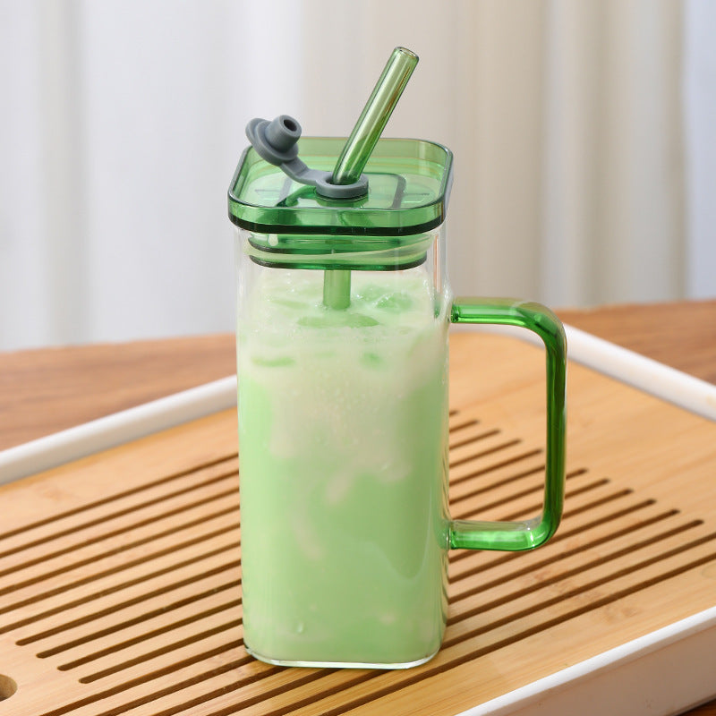 Women's drinking container with innovative lid system and integrated straw Stornfield