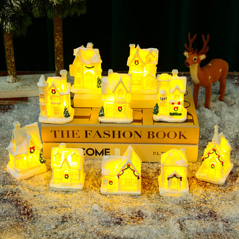 Illuminated Christmas village house with festive decoration Stornfield