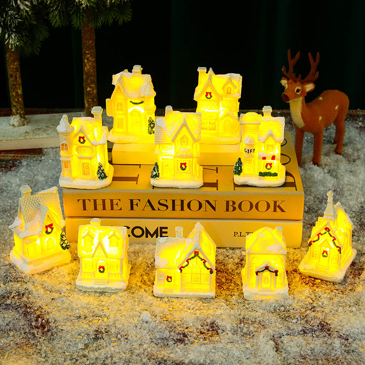 Illuminated Christmas village house with festive decoration Stornfield