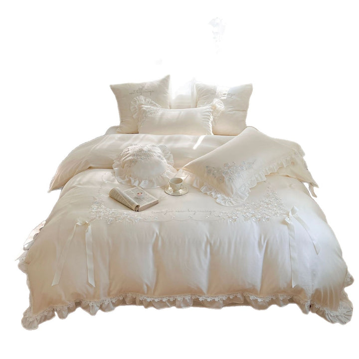 Romantic cotton satin bedding set with ruffles, floral embroidery, and satin bows