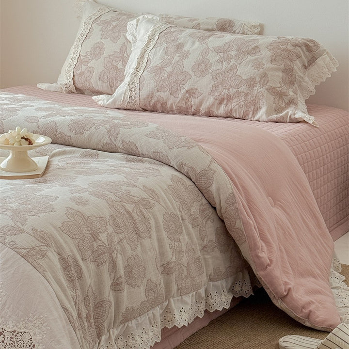 Vintage cotton bedding set with lace trim and hand-drawn floral pattern