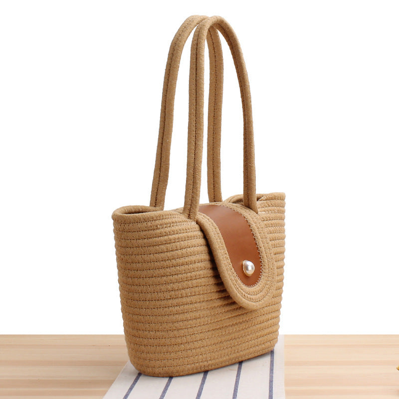 Elegant basket bag with leather flap closure Stornfield