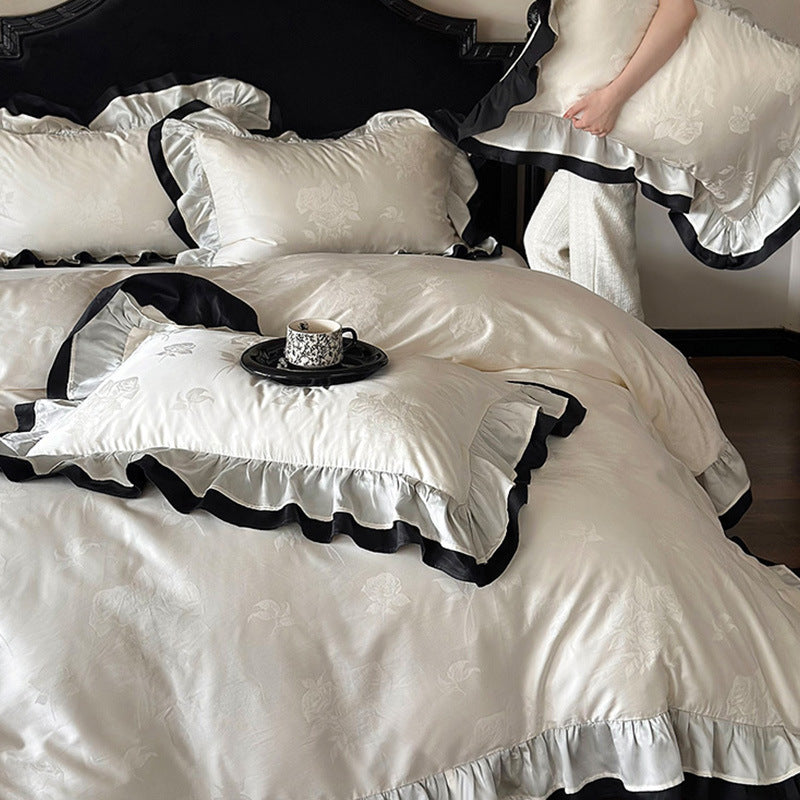 Luxurious cotton satin bedding set with decorative ruffle and contrasting edge finishing