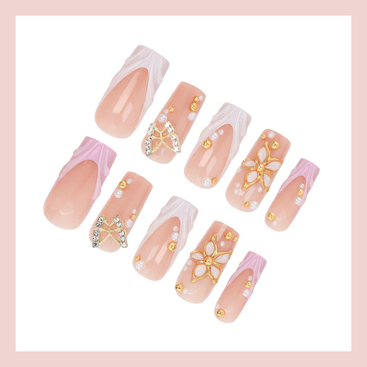Artificial nails with luxurious 3D decorations and elegant accents Stornfield