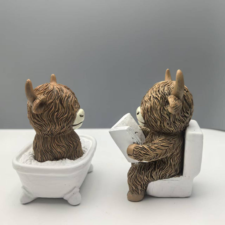 Funny decorative figure of a Highland cow in a bathtub Stornfield