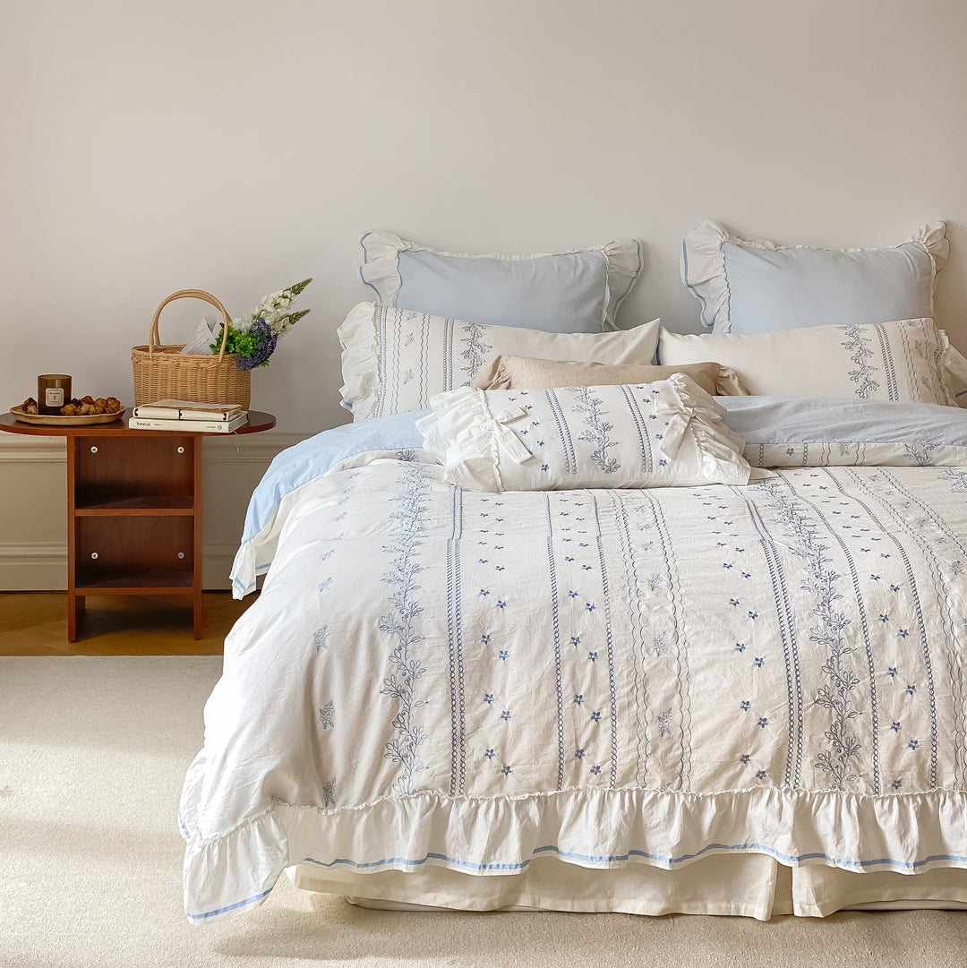 Country house bed set made of cotton with embroidery detail, ruffled edge and integrated bed skirt