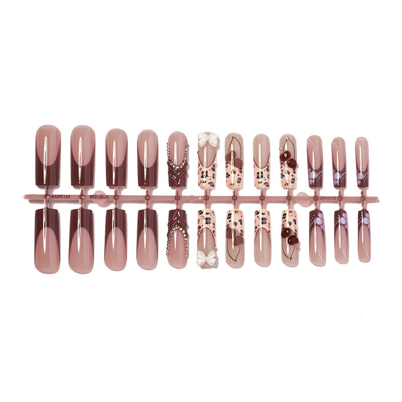 Artificial nail set with elegant flower and glitter effects Stornfield
