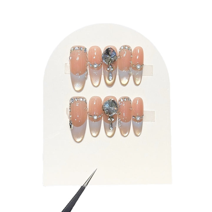 Artificial nails with elegant rhinestone accents Stornfield