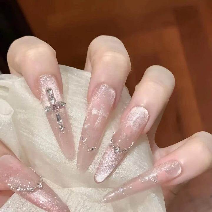 Glamorous Stiletto Nail Extensions with Rhinestone Accents