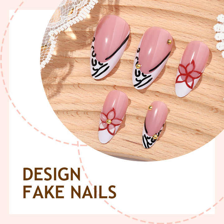 Artificial nail set with elegant ribbon and flower embellishments Stornfield