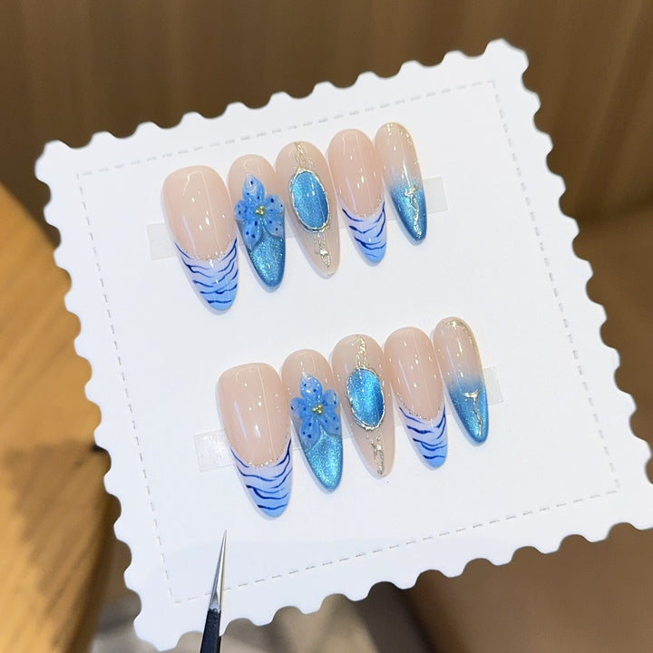 Artificial nails with exquisite flower and glitter patterns Stornfield