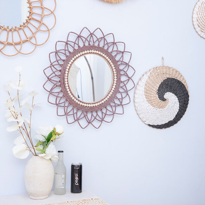 Decorative wall mirror with rattan frame Stornfield