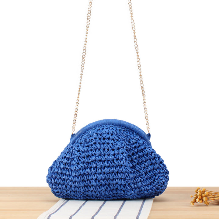 Shoulder bag made from handcrafted natural fibers with elegant chain decoration Stornfield