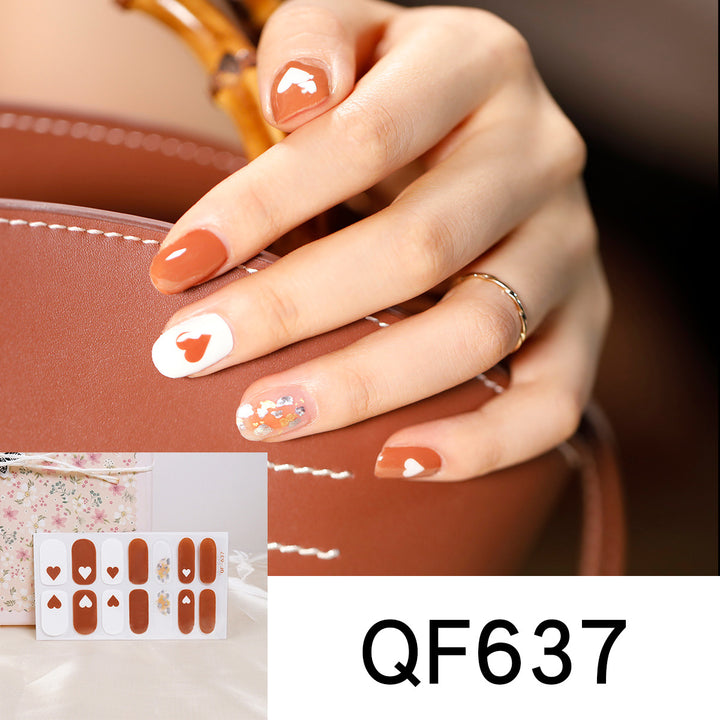 Artificial nail design with heart motif Stornfield