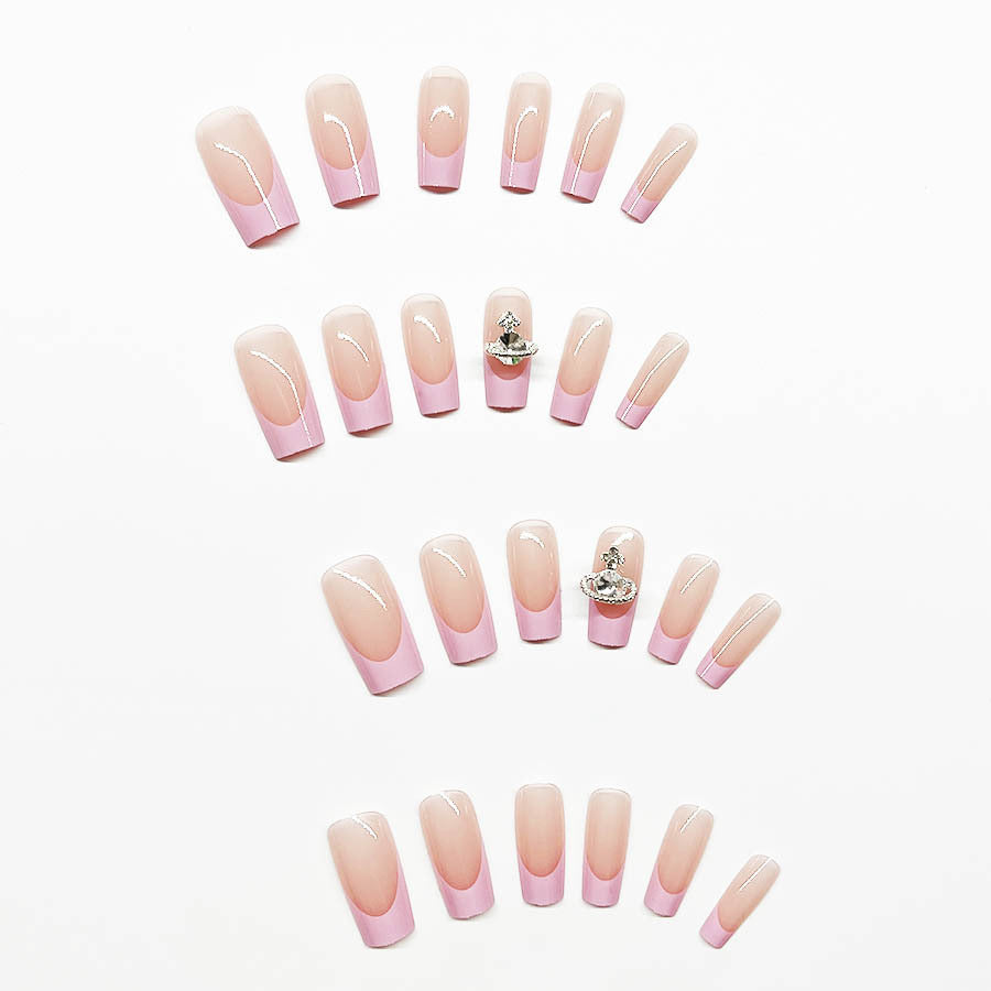 Acrylic nail set with luxurious floral and rhinestone decorations Stornfield