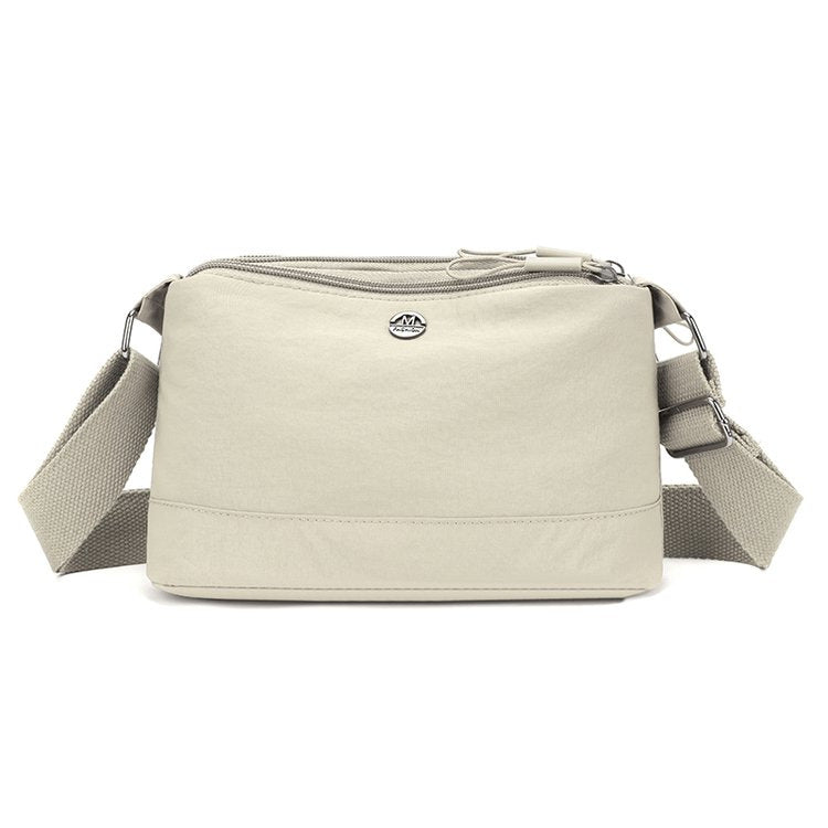 Shoulder bag with adjustable carrying strap and intelligent compartment system Stornfield