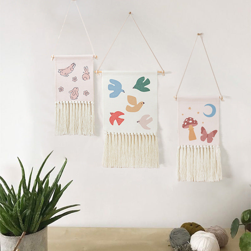 woven wall hanging with fringes and rabbit motif Stornfield