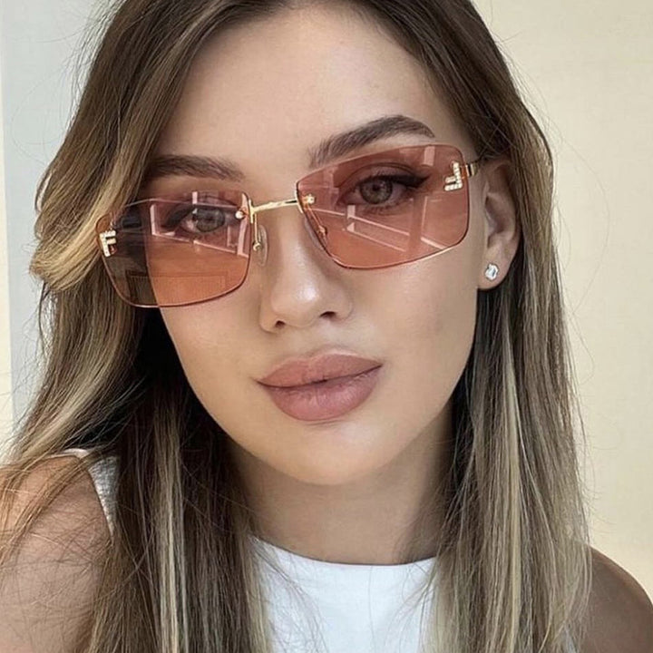 Ladies square sunglasses with elegant golden frame and stylish lenses Stornfield